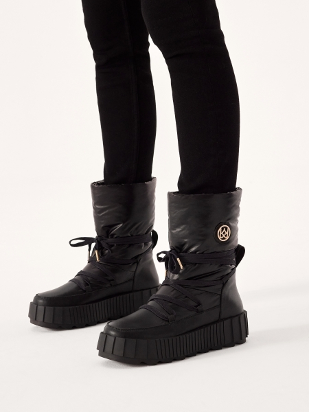 Bottes de neige noires isolées avec tige à enfiler  DAGE