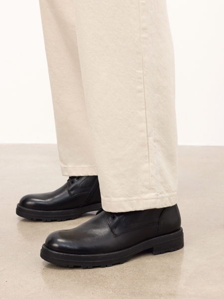 Bottes noires avec fermeture à glissière et fixation PAVELLI