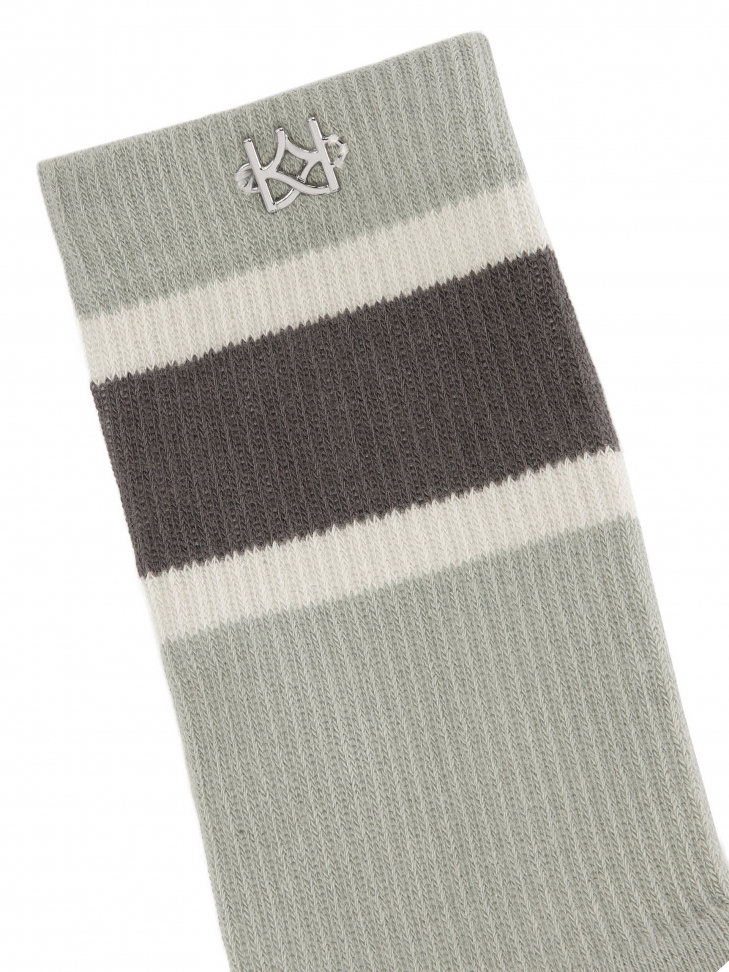 Chaussettes grises avec un petit monogramme TANEY